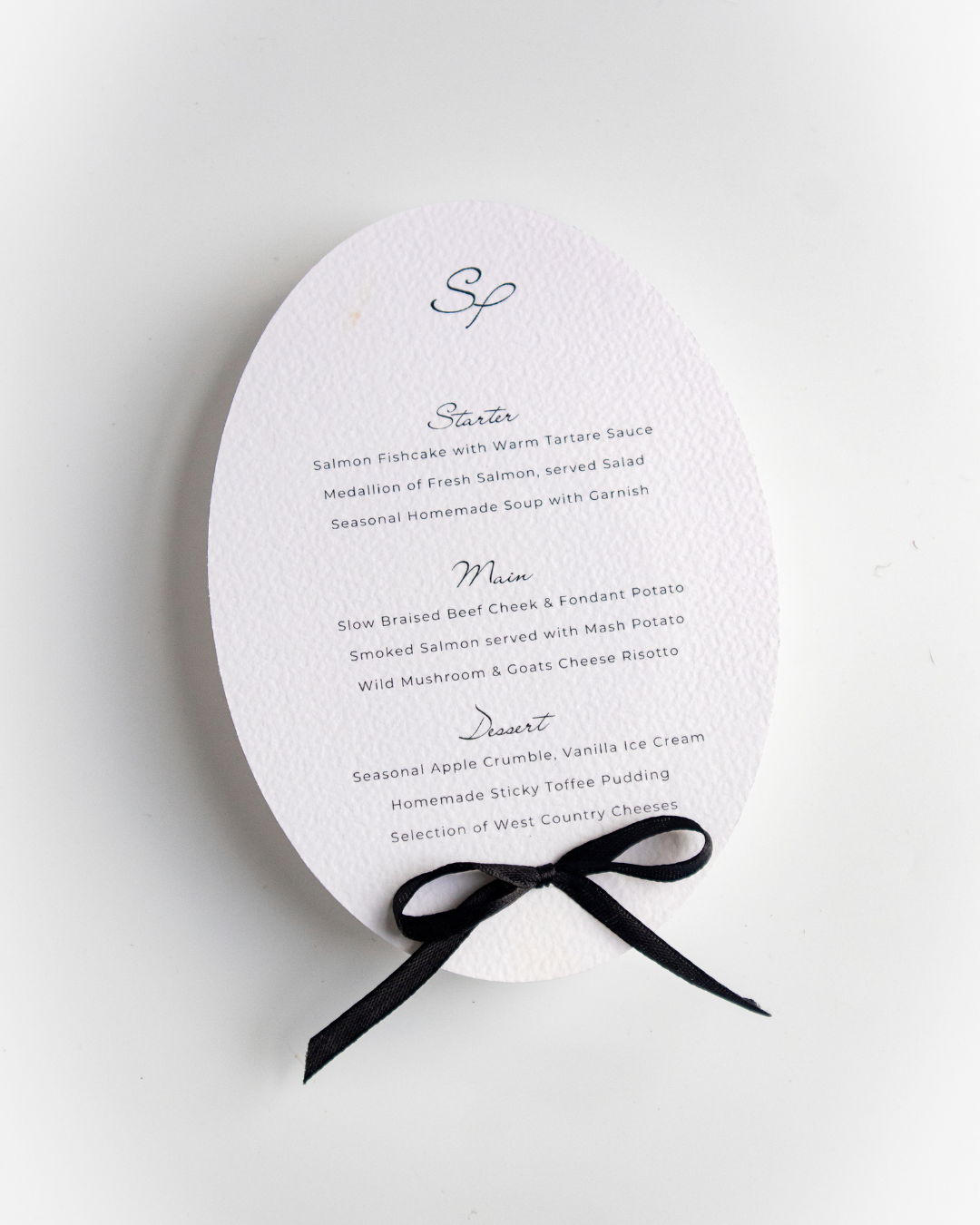 Round Black and White Menu with Ribbon